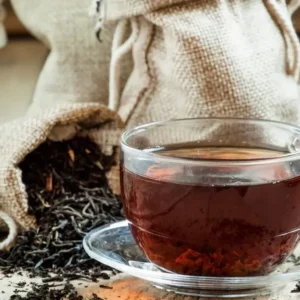 A cup of tea sitting on top of a saucer.