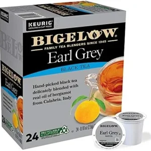 Bigelow Earl Grey tea k-cups featuring text about hand-picked black tea blended with calabrian bergamot oil, displaying 24 recyclable pods.