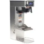 A Bunn ITCB-DV Infusion Single Coffee and Tea Brewer with Adjustable Shelf with a digital control panel and a built-in dispenser, made of stainless steel.