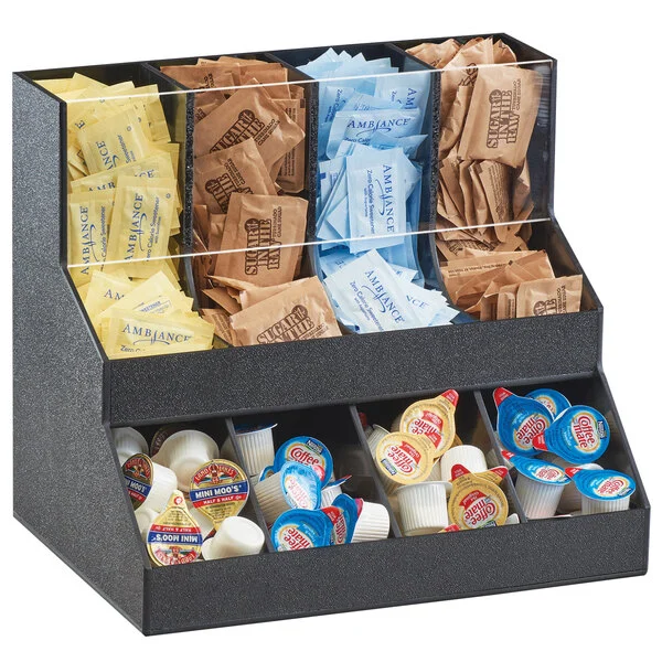 A Cal-Mil Classic 2 Level Condiment Display containing a variety of individually packaged condiments, including mustard, mayonnaise, and creamer cups.