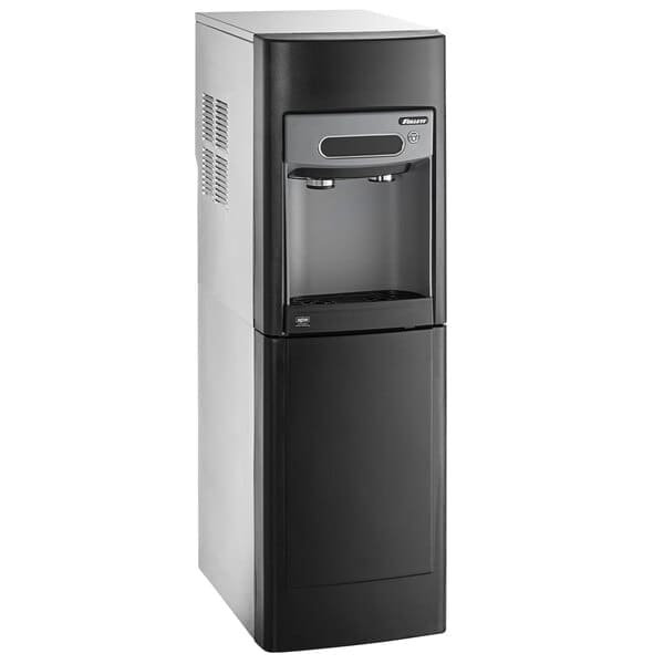 A modern black Follett 15 Series Countertop Ice and Water Maker with Optional Stand and a storage cabinet at the base.