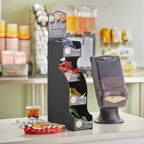 Condiment station with various sauces and napkins.