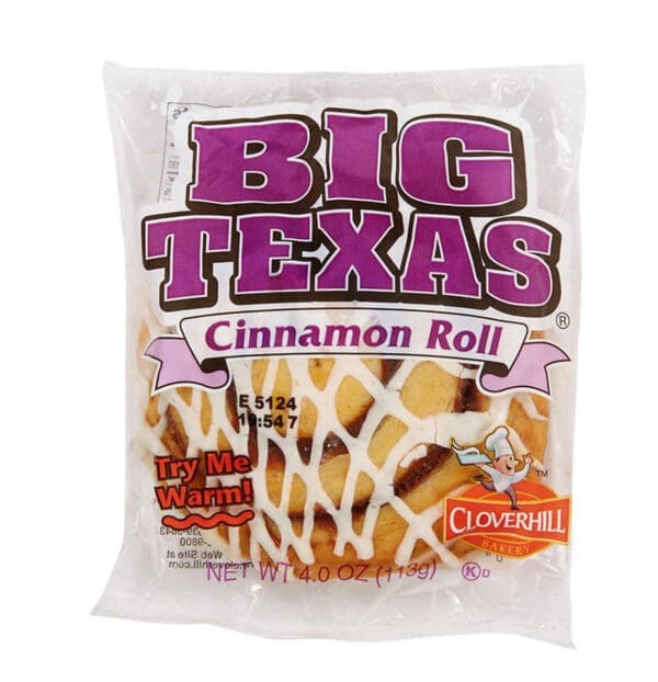 Packaged Big Texas Cinnamon Roll by Cloverhill, sealed in a clear plastic wrapper with purple and white label.