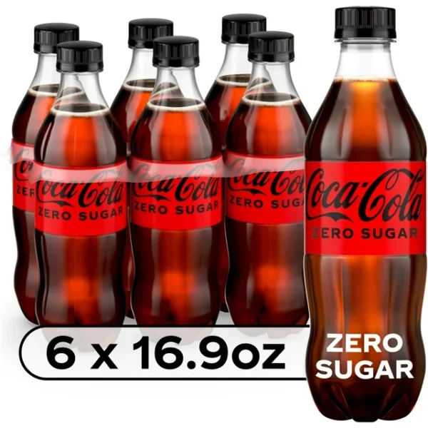 Six bottles of Coca-Cola Zero Sugar Soda Bottles, labeled, in a 16.9 oz size, arranged in two rows with a prominent logo and "zero sugar" text.