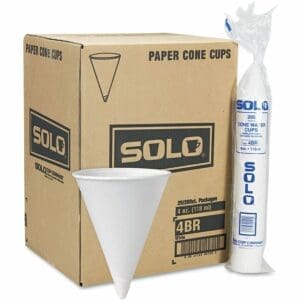 A cardboard box labeled "cone water cups" next to a plastic-wrapped package of white cone-shaped paper cups.