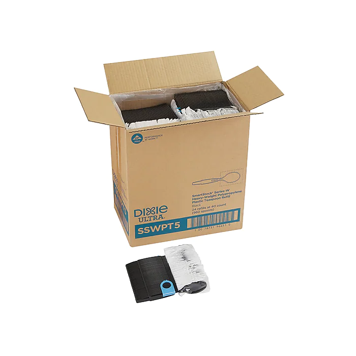 An open cardboard box labeled "Dixie Ultra SmartStock Series-W Individually Wrapped Tea Spoon Refill" partially filled with white paper plates and a small stack of black and white elastic bands in front.