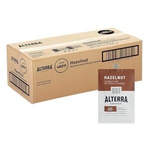 A cardboard box of FLAVIA ALTERRA Coffee, Hazelnut flavor, with product details and barcodes visible on the label.