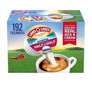 A box of Land O'Lakes Mini Moo's Half and Half creamers, highlighting "192 creamers" and "made with real milk & cream," with an image of cream pouring into coffee.