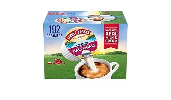 A box of Land O'Lakes Mini Moo's Half and Half creamers, highlighting "192 creamers" and "made with real milk & cream," with an image of cream pouring into coffee.