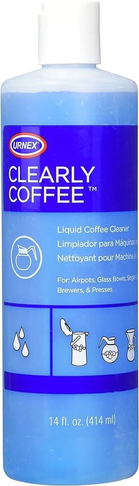 A bottle of Clearly Coffee Pot Cleaner liquid cleaner for coffee machines, with labels in English and Spanish, 14 fl. oz (414 ml) capacity.