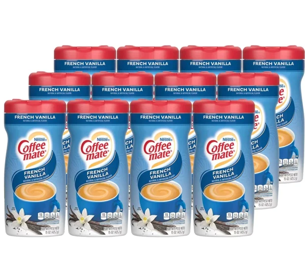 Multiple bottles of Nestle Coffee Mate French Vanilla Powdered Creamer arranged neatly in rows.