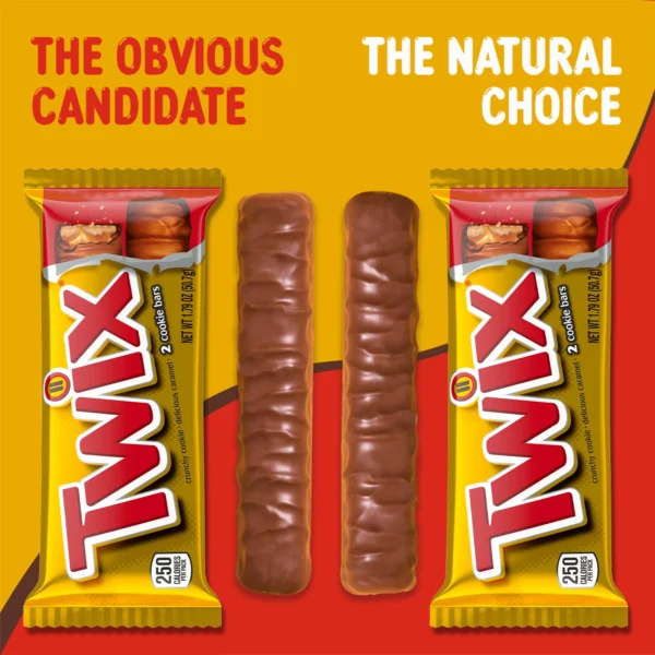 Two Twix chocolate cookie bars on a red background.